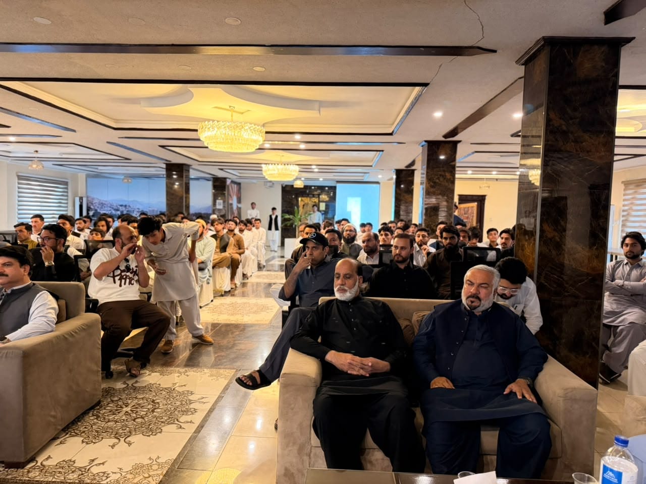 Elders & Guests Alongside Youth